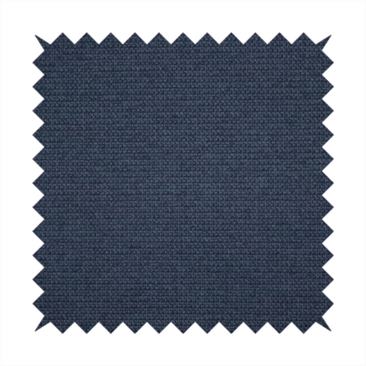 A textured navy blue fabric with a tight, uniform cross-weave pattern.