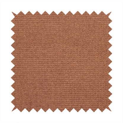 A textured terracotta orange fabric with a tight, uniform weave.