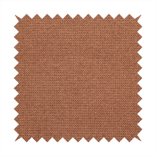 A textured terracotta orange fabric with a tight, uniform weave.
