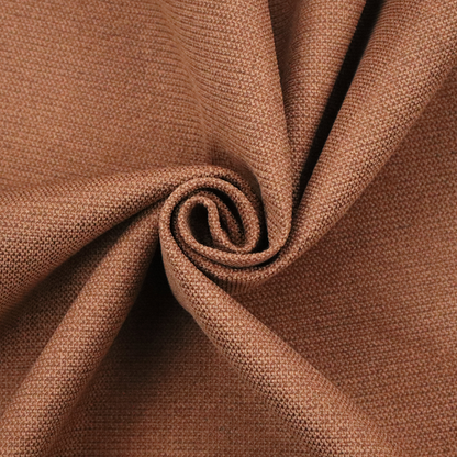 A textured terracotta orange fabric with a tight, uniform weave.
