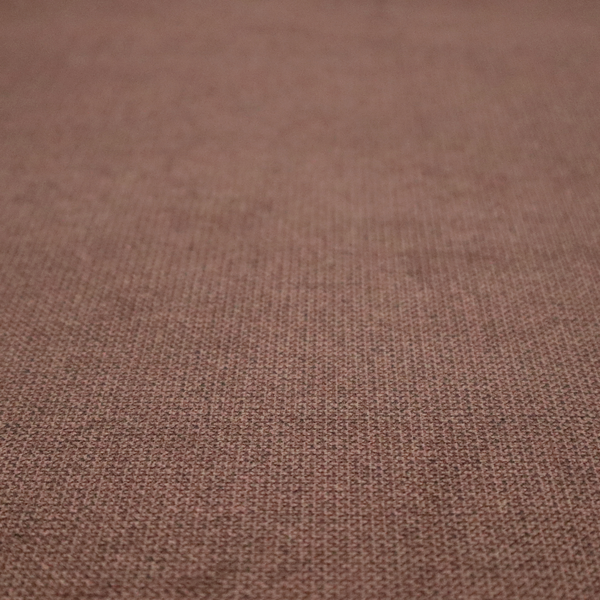 A textured dark terracotta brown fabric with a tight, uniform cross-weave.