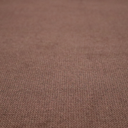 A textured dark terracotta brown fabric with a tight, uniform cross-weave.