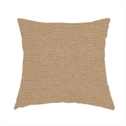 The fabric used to create this handmade cushion is a textured beige fabric with a tight, uniform cross-weave.