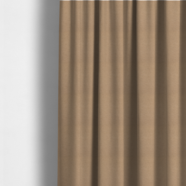 The fabric used to create these made-to-measure curtains is a textured beige fabric with a tight, uniform cross-weave.