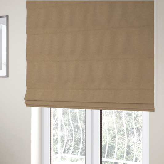 The fabric used to create these Roman blinds is a textured beige fabric with a tight, uniform cross-weave.