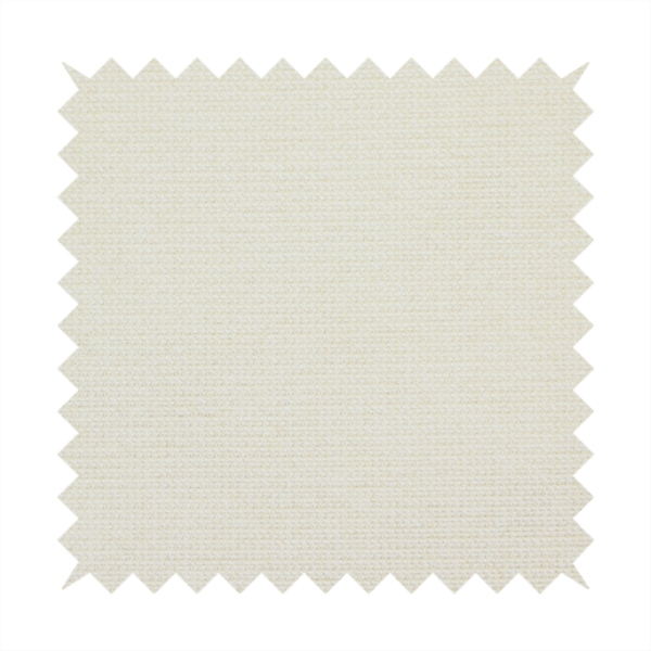 A textured cream-coloured fabric with a tight, uniform cross-weave.
