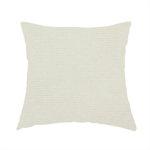 The fabric used to create this handmade cushion is a textured cream-coloured fabric with a tight, uniform cross-weave.
