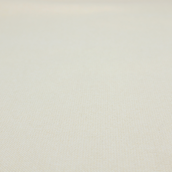 A textured cream-coloured fabric with a tight, uniform cross-weave.