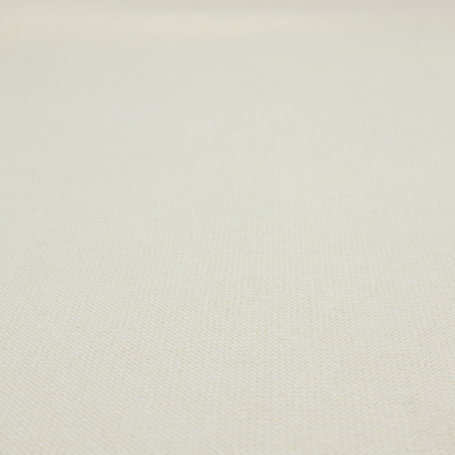 A textured cream-coloured fabric with a tight, uniform cross-weave.