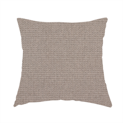 The fabric used to create this handmade cushion is a textured taupe fabric with a tight, uniform cross-weave.