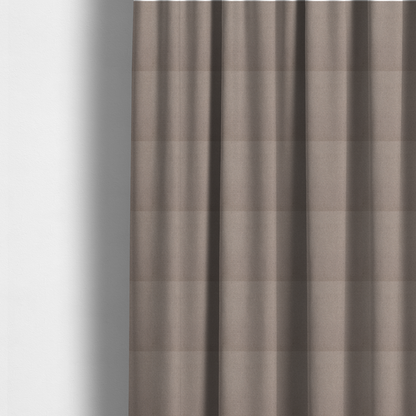 The fabric used to create these made-to-measure curtains is a textured taupe fabric with a tight, uniform cross-weave.