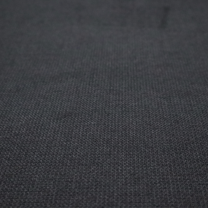 A textured near-black fabric with a tight, uniform cross-weave.