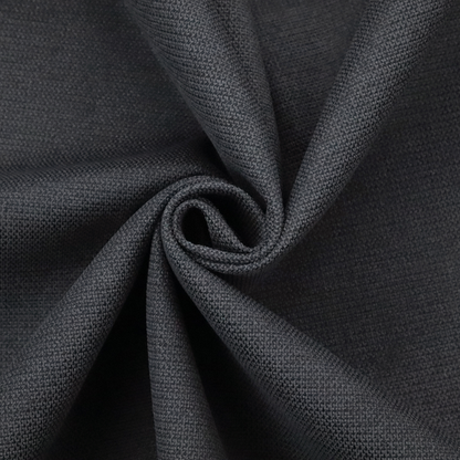 A textured near-black fabric with a tight, uniform cross-weave.