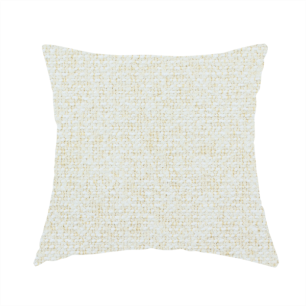 The fabric used to create this handmade cushion is a textured cream and off-white woven fabric.