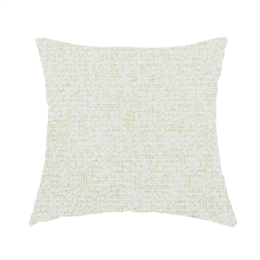 The fabric used to create this handmade cushion is a textured cream and off-white woven fabric.