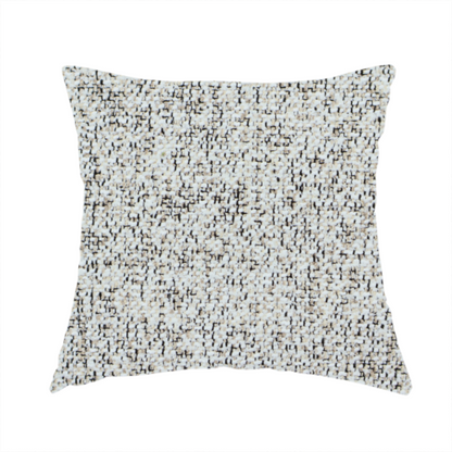 The fabric used to create this handmade cushion is a cream, beige, and charcoal grey woven upholstery fabric swatch.
