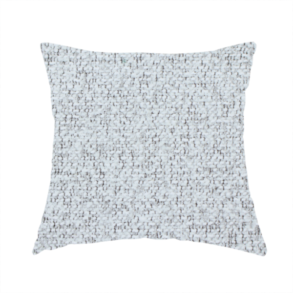 The fabric used to create this handmade cushion is a textured light grey and off-white woven fabric.