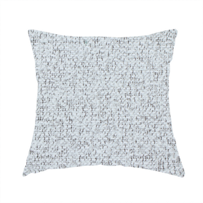 The fabric used to create this handmade cushion is a textured light grey and off-white woven fabric.