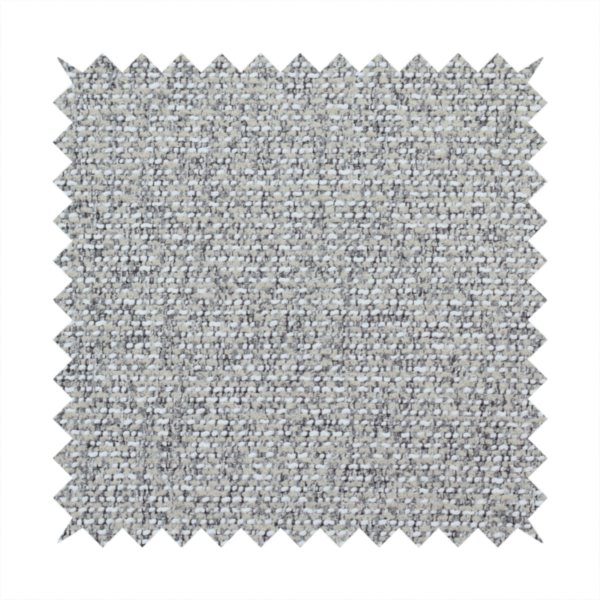 A textured mid-grey and off-white woven fabric.