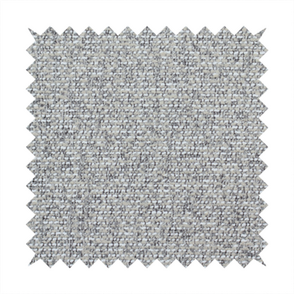 A textured mid-grey and off-white woven fabric.