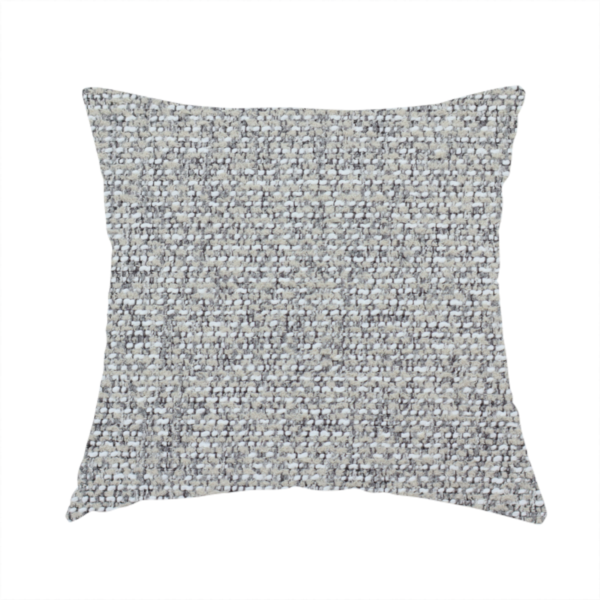The fabric used to create this handmade cushion is a textured mid-grey and off-white woven fabric.