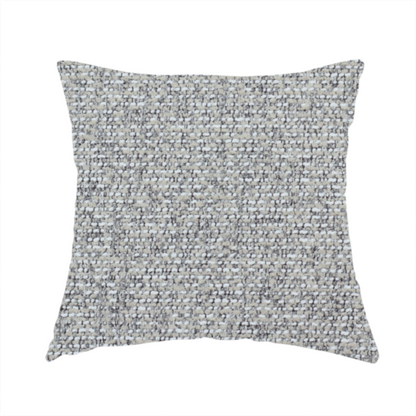 The fabric used to create this handmade cushion is a textured mid-grey and off-white woven fabric.