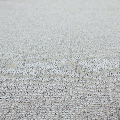 A textured mid-grey and off-white woven fabric.