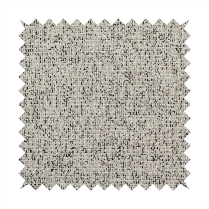 A textured taupe, beige, and charcoal woven fabric swatch.