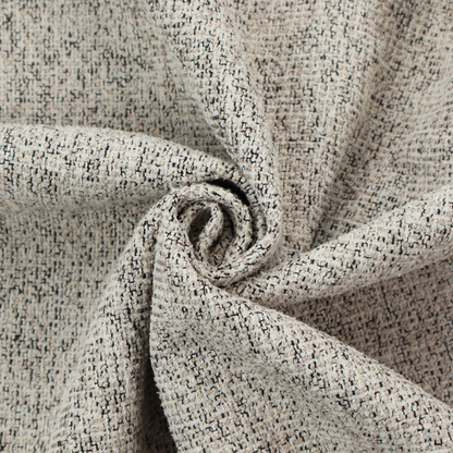 A textured taupe, beige, and charcoal woven fabric swatch.