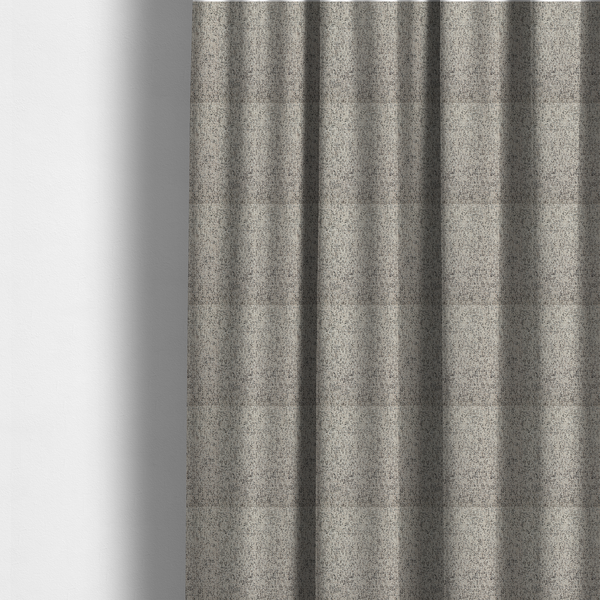 The fabric used to create these made-to-measure curtains is a textured taupe, beige, and charcoal woven fabric swatch.