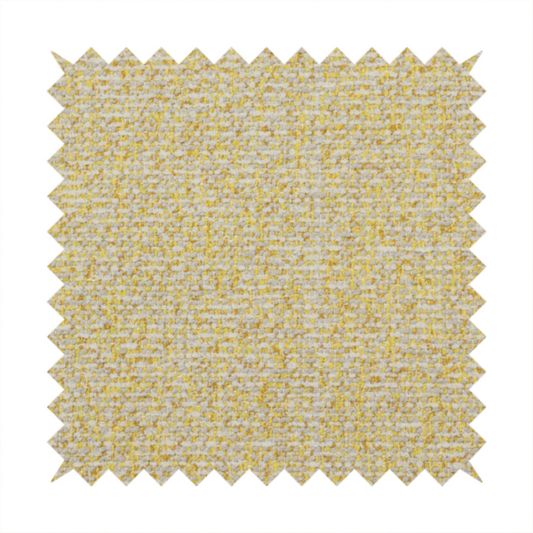 A textured yellow and beige woven fabric.