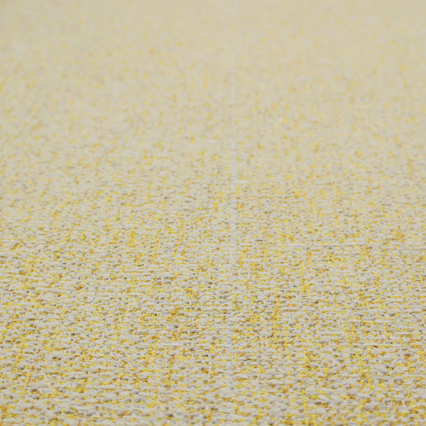 A textured yellow and beige woven fabric.