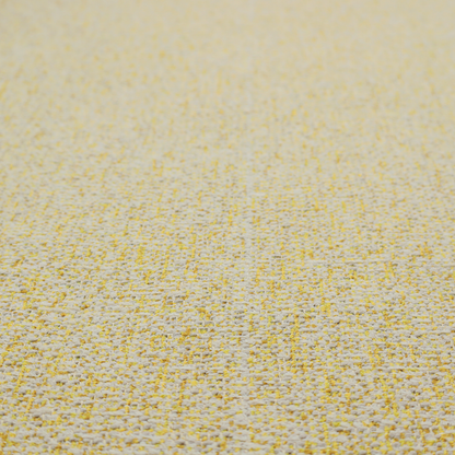 A textured yellow and beige woven fabric.
