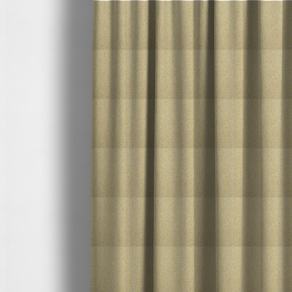 The fabric used to create these made-to-measure curtains is a textured yellow and beige woven fabric.