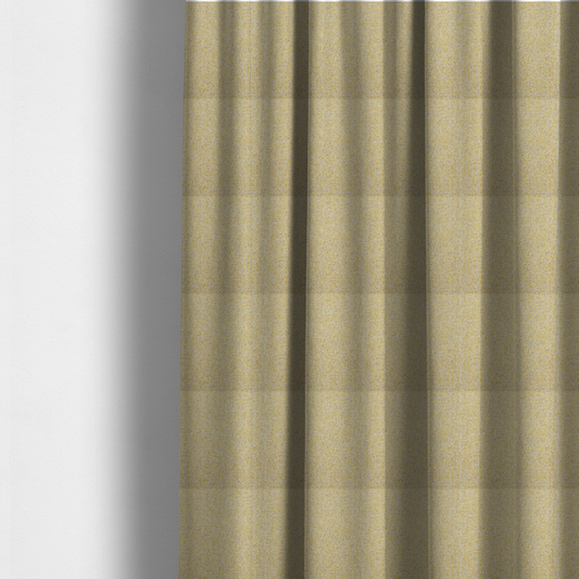 The fabric used to create these made-to-measure curtains is a textured yellow and beige woven fabric.