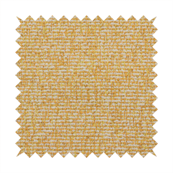 A textured mustard yellow and off-white woven upholstery fabric.