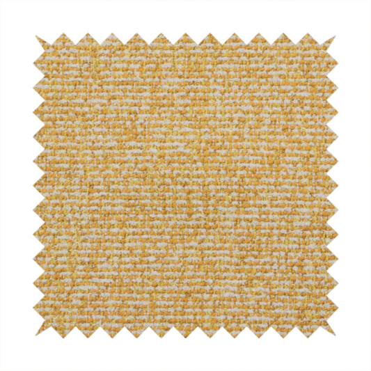 A textured mustard yellow and off-white woven upholstery fabric.