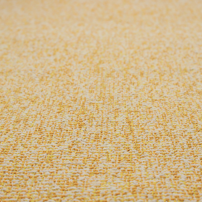 A textured mustard yellow and off-white woven upholstery fabric.