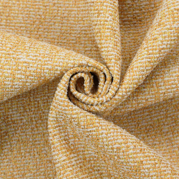 A textured mustard yellow and off-white woven upholstery fabric.