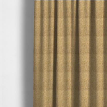 The fabric used to create these made-to-measure curtains is a textured mustard yellow and off-white woven upholstery fabric.