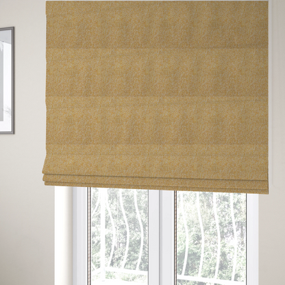The fabric used to create these Roman blinds is a textured mustard yellow and off-white woven upholstery fabric.