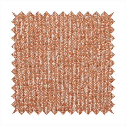 A textured terracotta orange and off-white woven upholstery fabric.