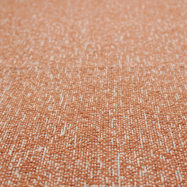 A textured terracotta orange and off-white woven upholstery fabric.