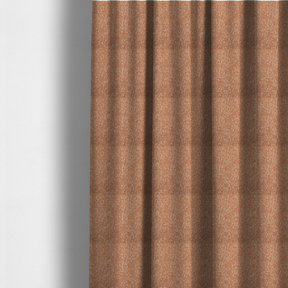 The fabric used to create these made-to-measure curtains is a textured terracotta orange and off-white woven upholstery fabric.