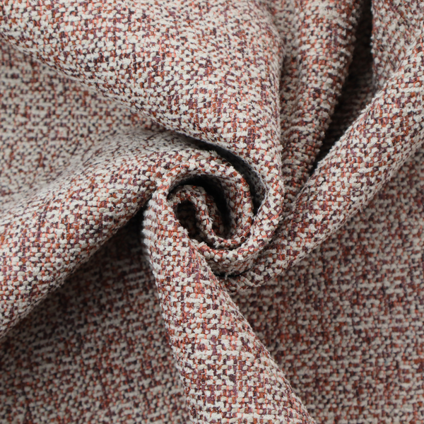 A textured rust red and beige woven upholstery fabric.