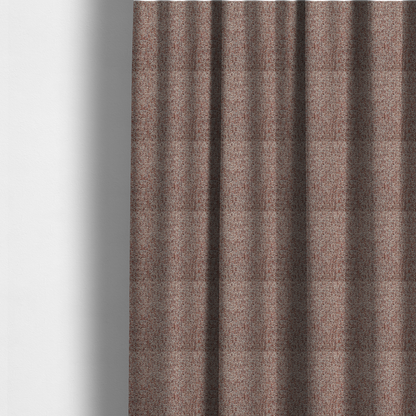 The fabric used to create these made-to-measure curtains is a textured rust red and beige woven upholstery fabric.