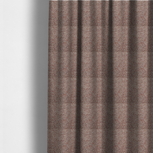 The fabric used to create these made-to-measure curtains is a textured rust red and beige woven upholstery fabric.