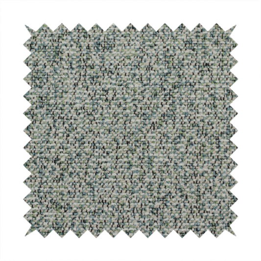 A multi-tonal teal and grey textured woven fabric swatch.