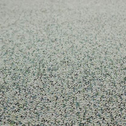 A multi-tonal teal and grey textured woven fabric swatch.