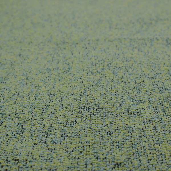 A textured moss green and teal woven upholstery fabric swatch.